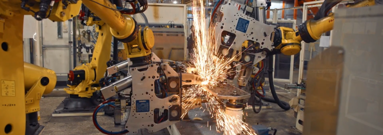 Manufacturing with robotic arms